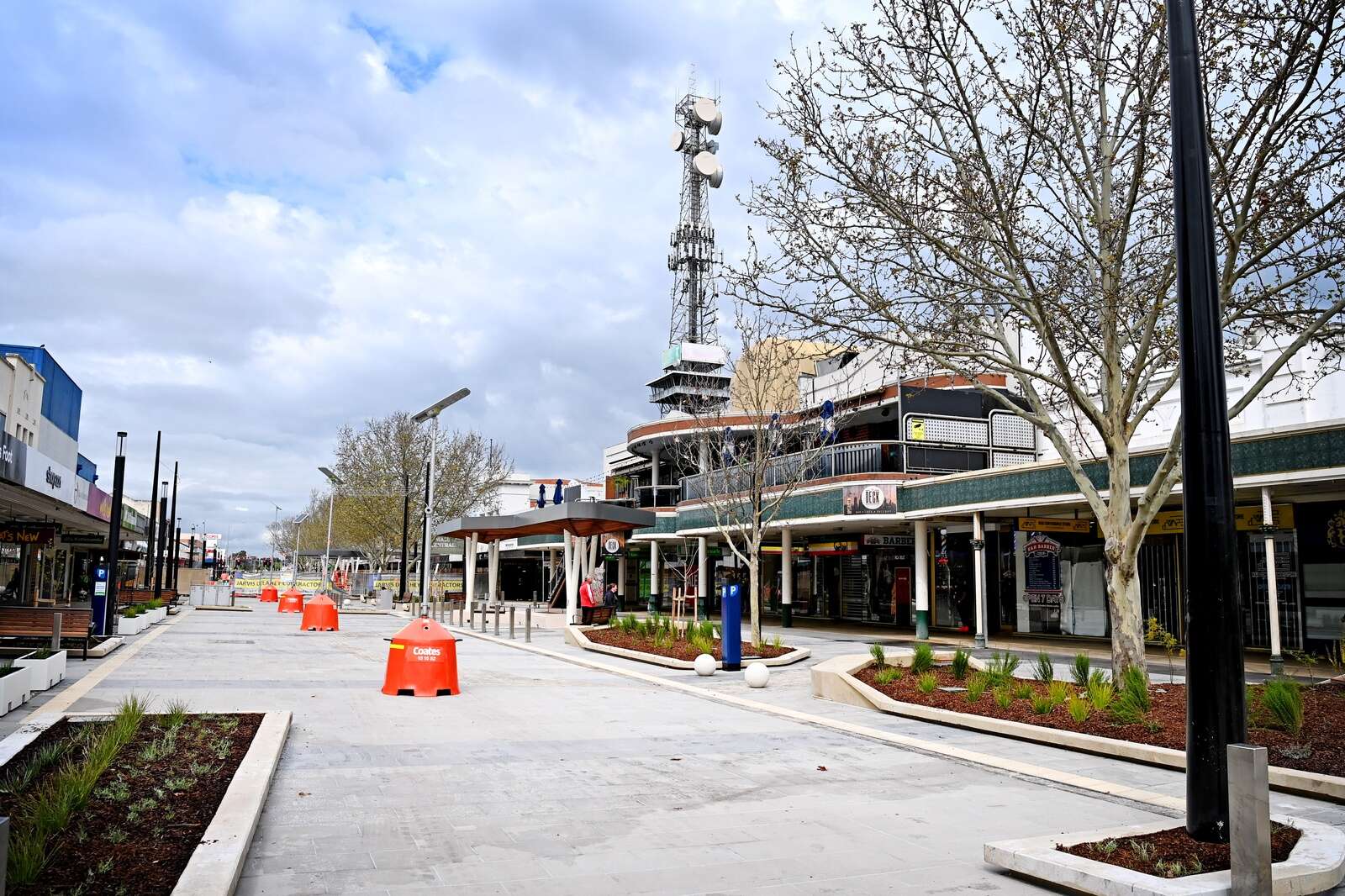Hoardings come down to reveal fresh look for top end of mall