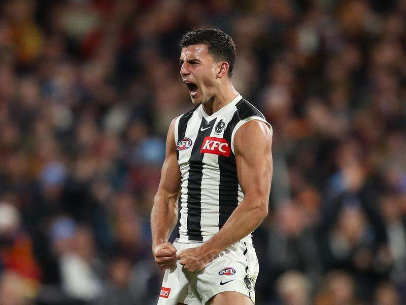 Pies star doubles up on awards as Brownlow looms