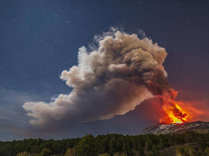 Italy's Mount Etna lights up night sky Riverine Herald