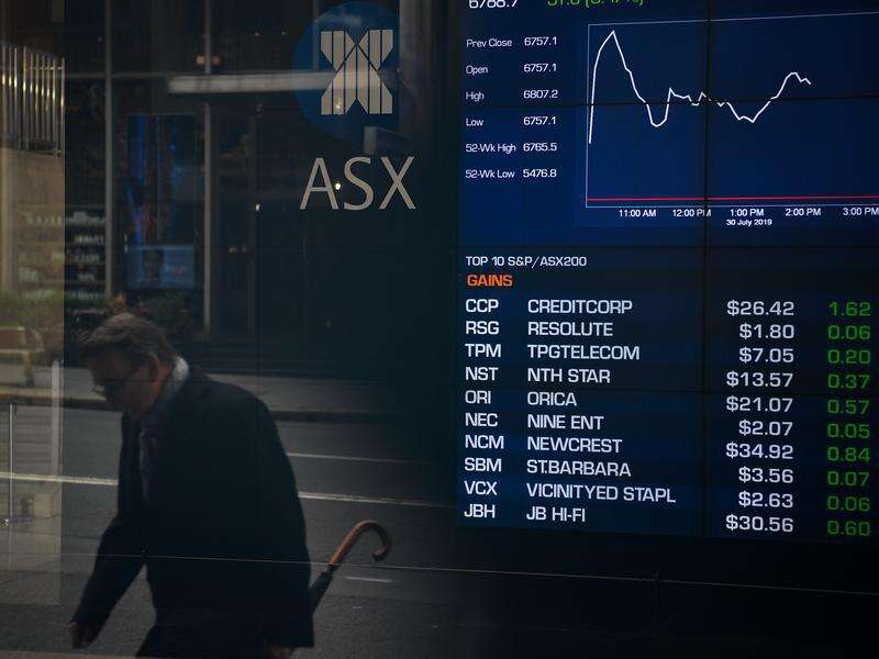 Australian shares flat as miners continue to drag