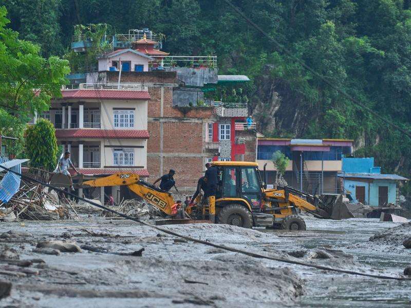 Fears for 'lovely' Australians missing in Nepal flood