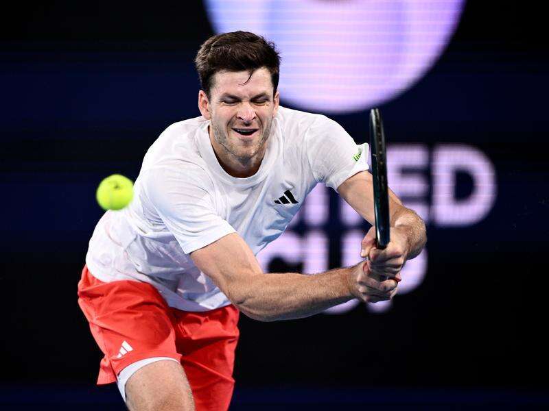 Poland push Swiss into doubles decider in Cup final