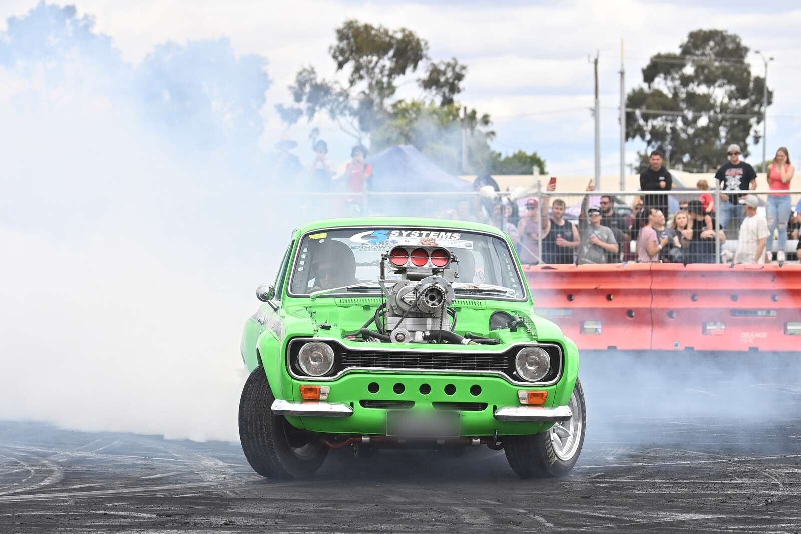 Fans just love the smell of burning rubber in the morning, during the ...
