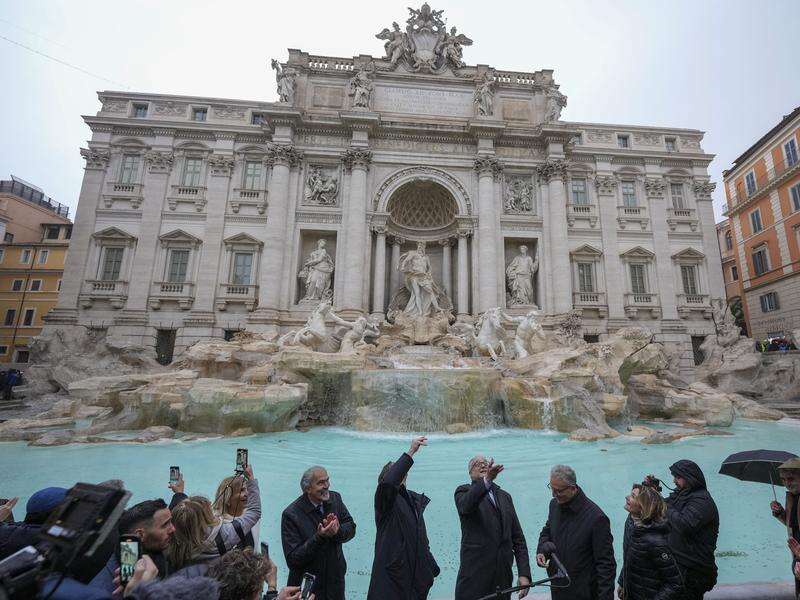 Tourists begin paying to see Rome's Trevi Fountain