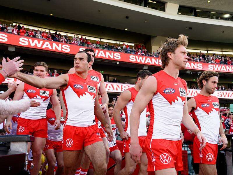 Swans win first AFL game after hotel scandal