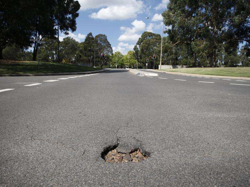 Respected motorcyclist dies after hitting pothole