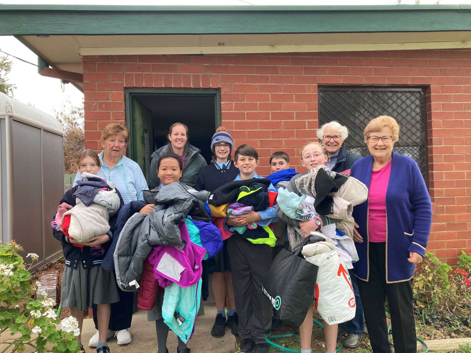 Mini Vinnies warm hearts with winter donations for families | Dairy ...