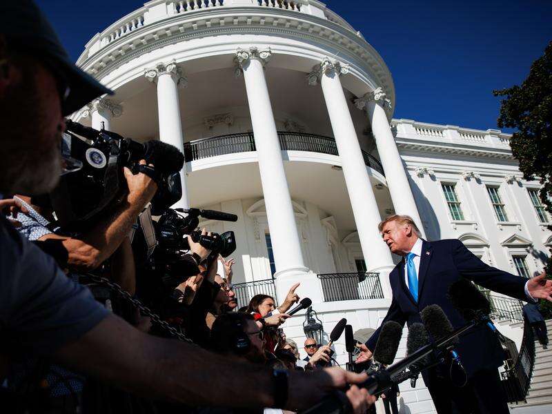 Justice Department Probes TV Pool Boycott Over Trump Ban
