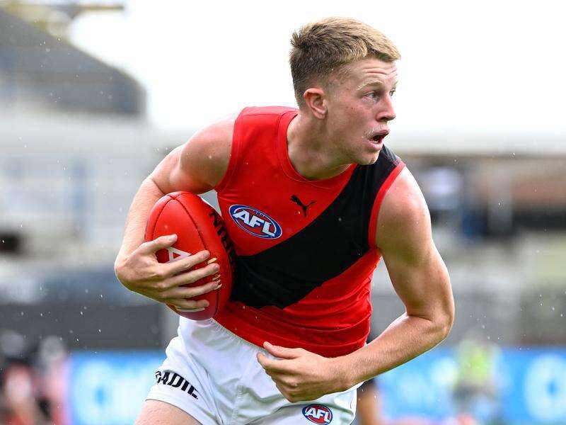 Essendon slapped with $20,000 fine for umpire contact