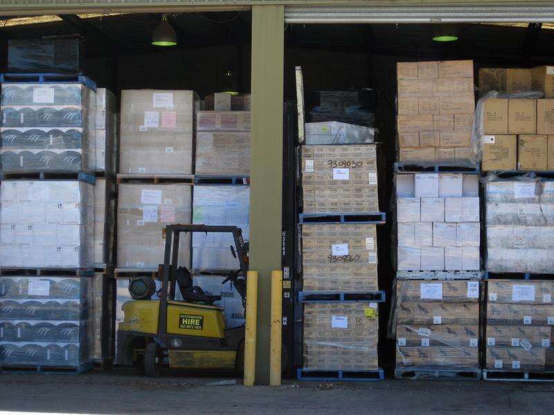 Woolworths worker dies after pallet stack collapses Shepparton News
