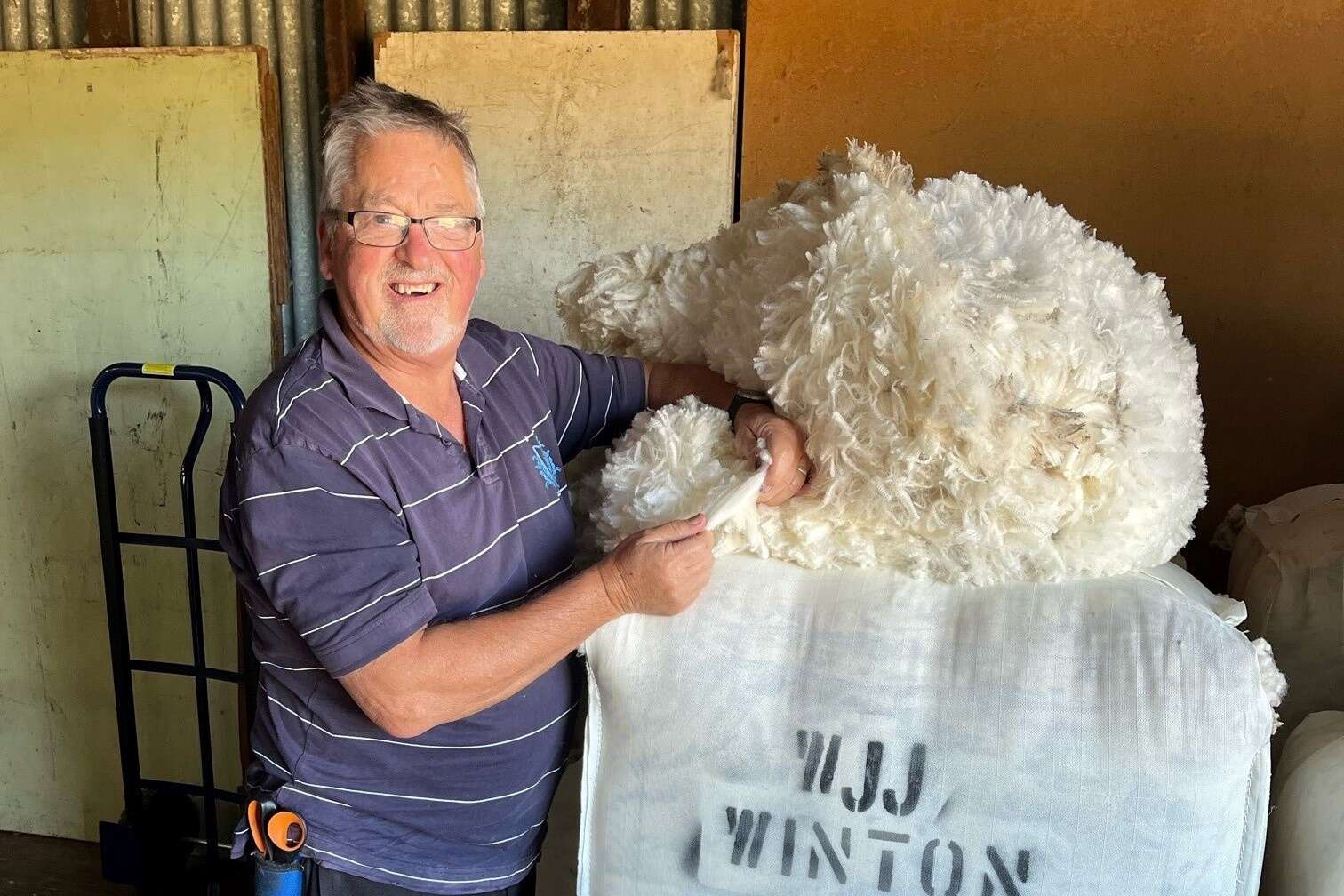 Ray grades wool in honour of friend Joe, who passed away in May ...