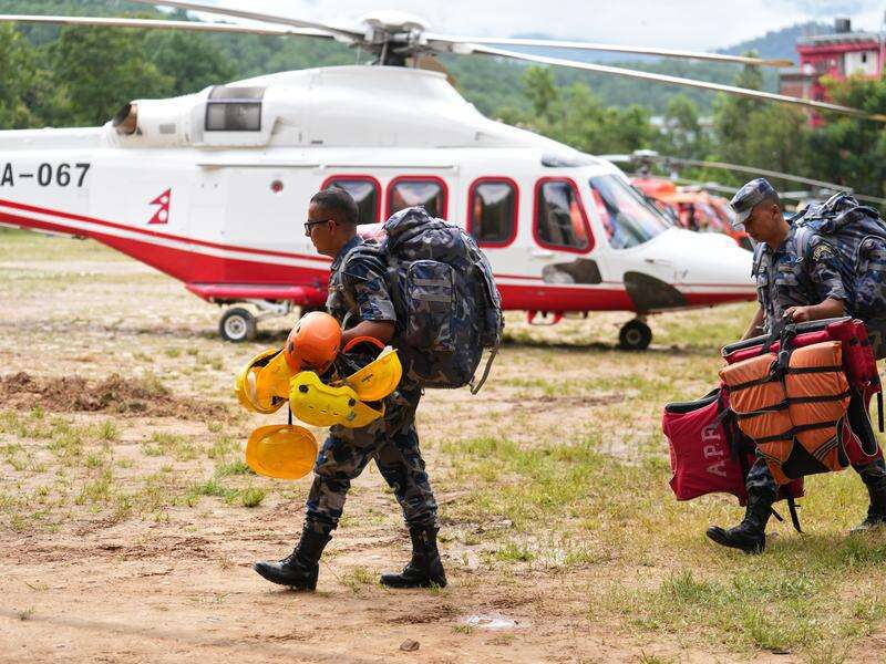 Nepal teams seek hundreds trapped in hydropower tunnels