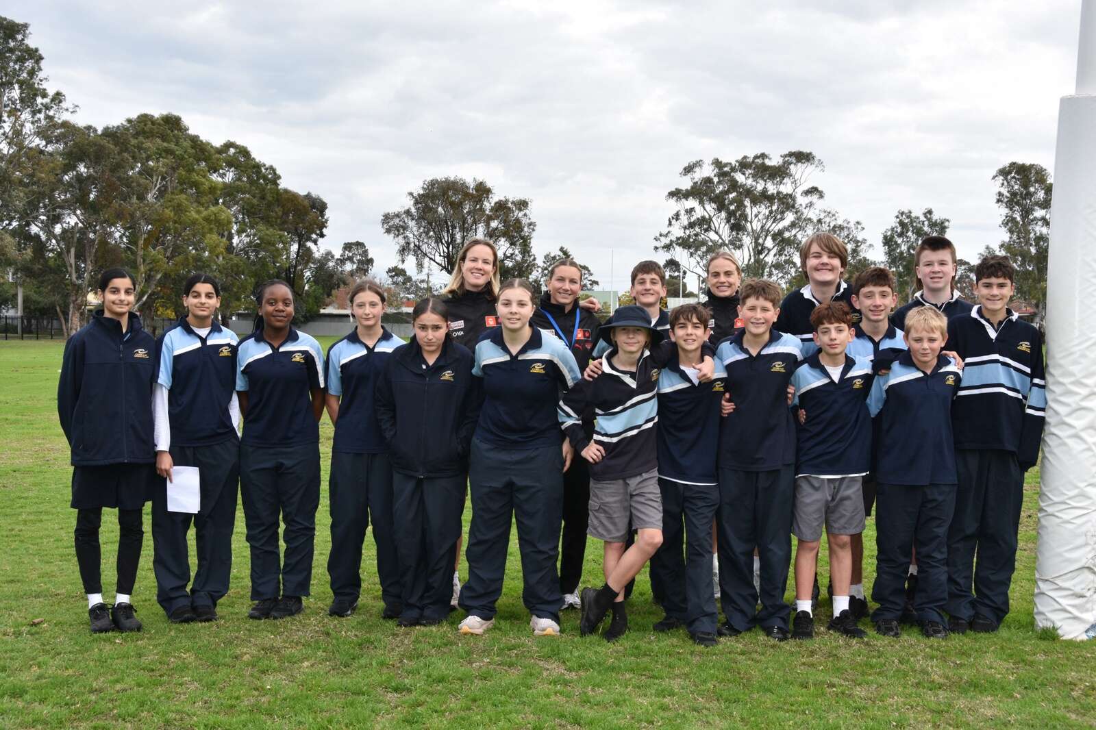 Essendon AFLW players visit Cobram kids