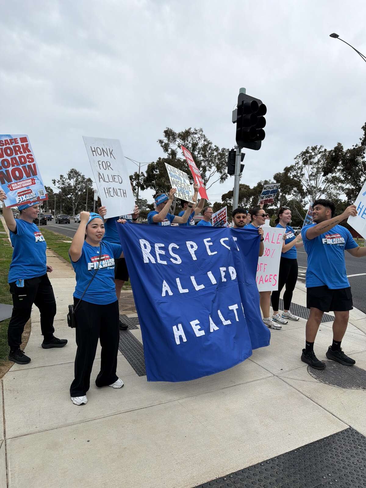 Health workers, doctors walk off in double strike