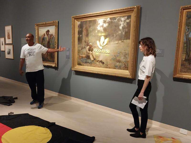 Artist who defaced painting says police raided her home | Country News