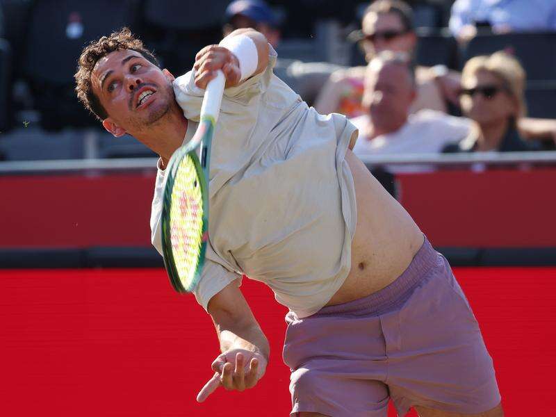 Evans Upsets Tiafoe in Thrilling Grasscourt Showdown