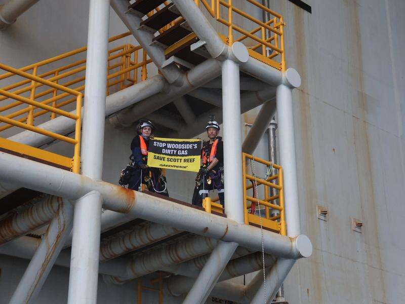 Activists occupy Woodside's floating gas platform