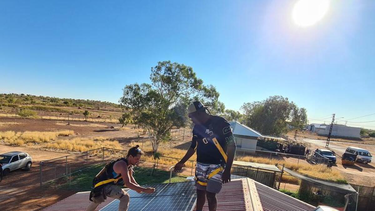 Ttraditional owner Norman Jupurrurla Frank's solar installation