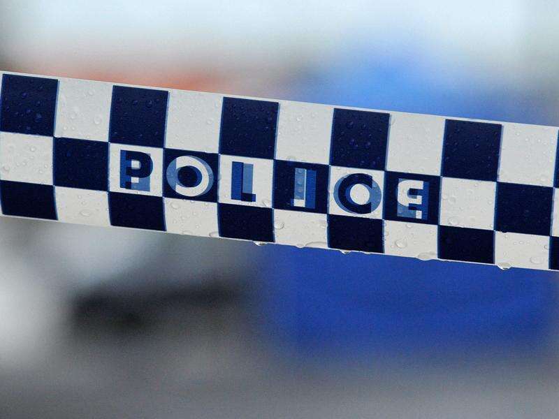 Group of balaclava-clad men storm train, held by police | Riverine Herald