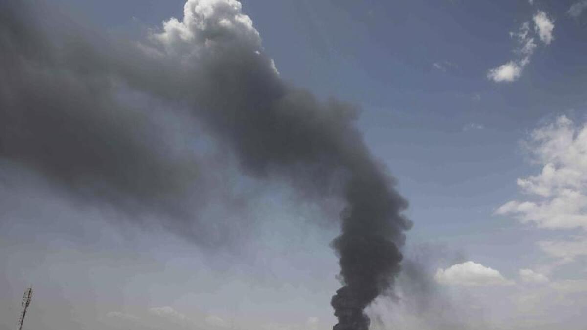 Smoke rises over Khartoum