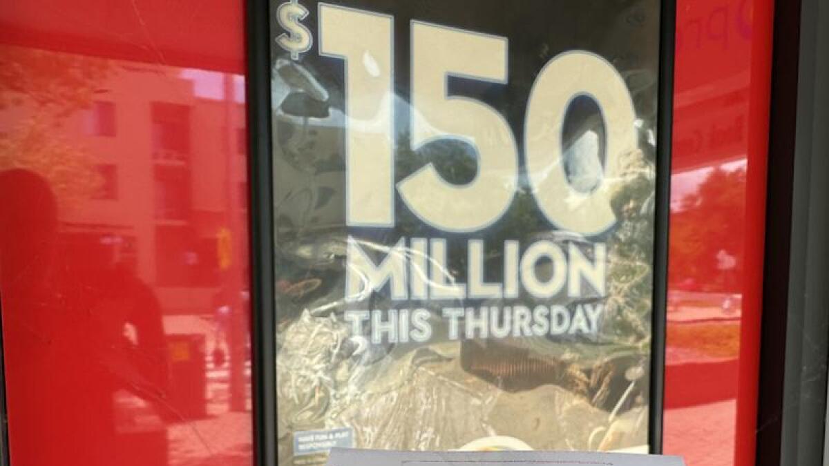 Powerball sign and ticket