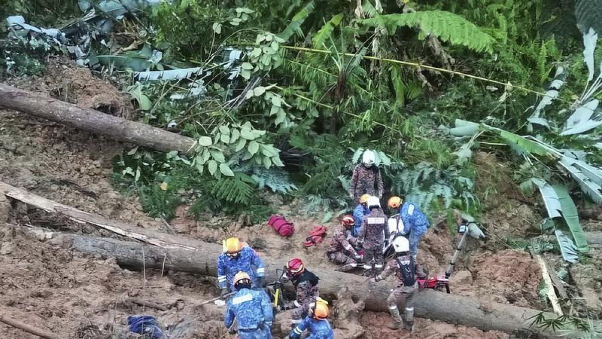 Rescuers searching for survivors after a landslide