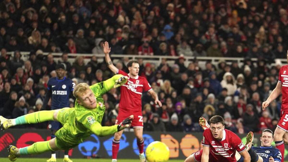 Middlesbrough goalkeeper Tom Glover watches a Conor Gallagher effort. 