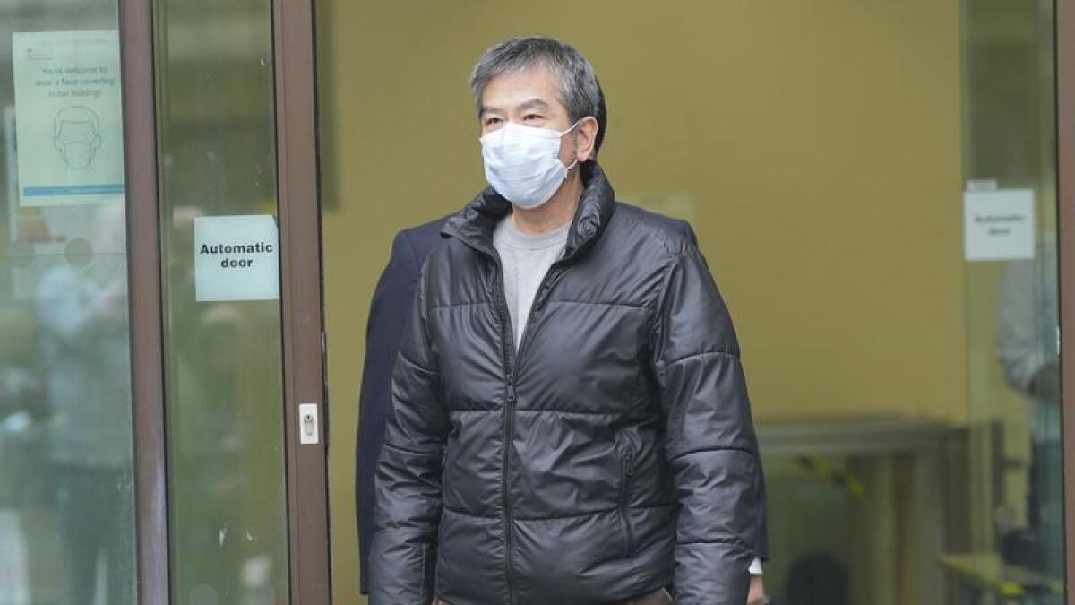 Bill Yuen Chung-biu leaves Westminster Magistrates Court in London