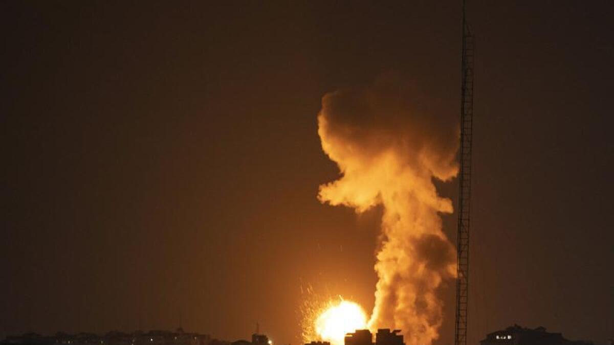 Fire and smoke rise following an Israeli airstrike in northern Gaza