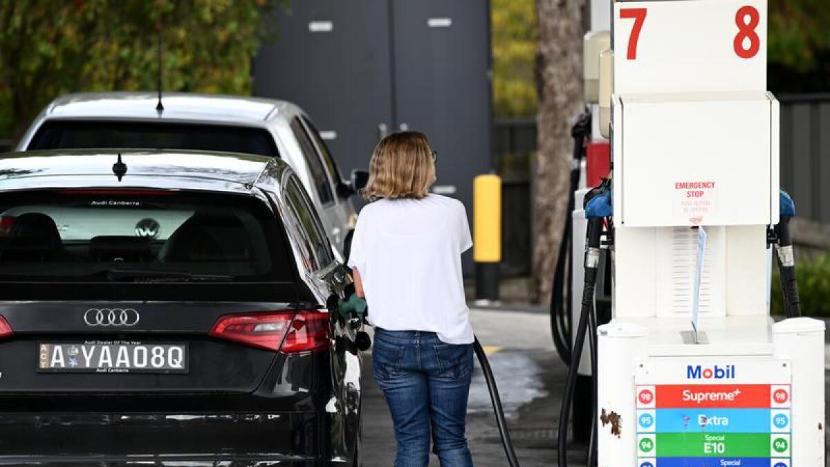 A person at the pump of a petrol retailer (file image)