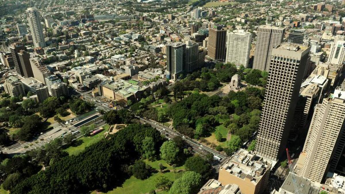 A stabbed police officer chased his attacker into Sydney's Hyde Park.