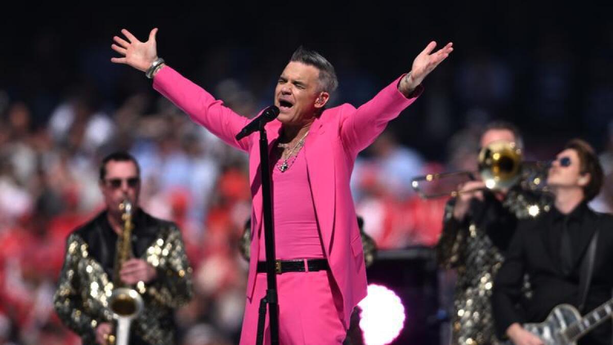 Robbie Williams performs before the AFL Grand Final