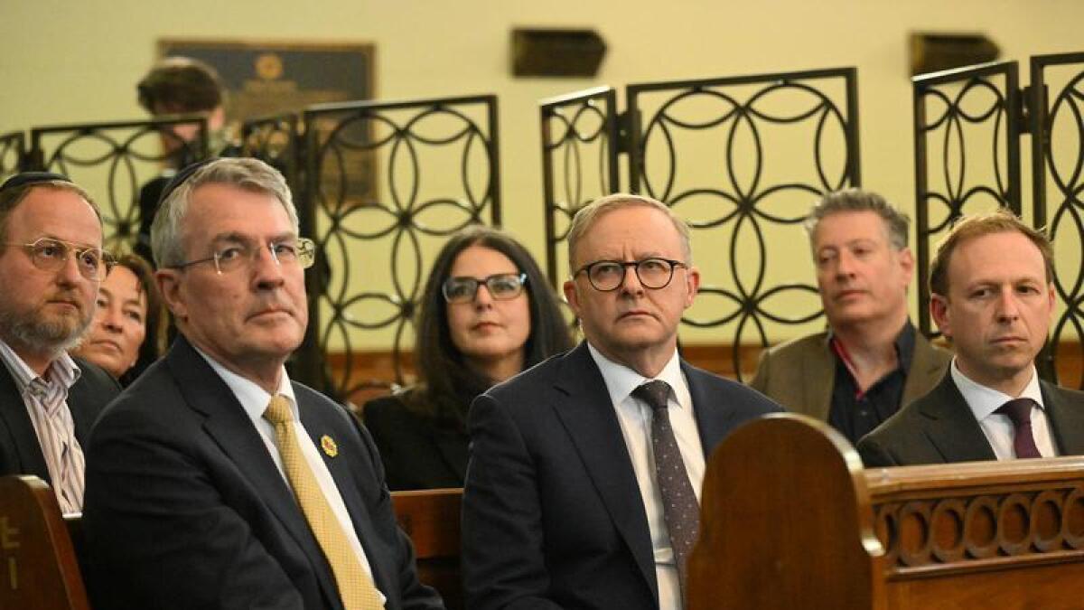 AG Mark Dreyfus (2nd left) and PM Anthony Albanese (centre)