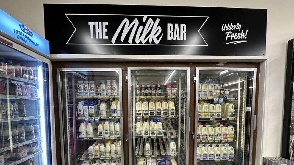 Milk in a refrigerator at a supermarket