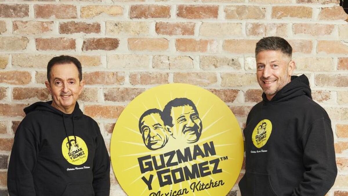 Guzman y Gomez co-CEOs Hilton Brett (left) and Steven Marks