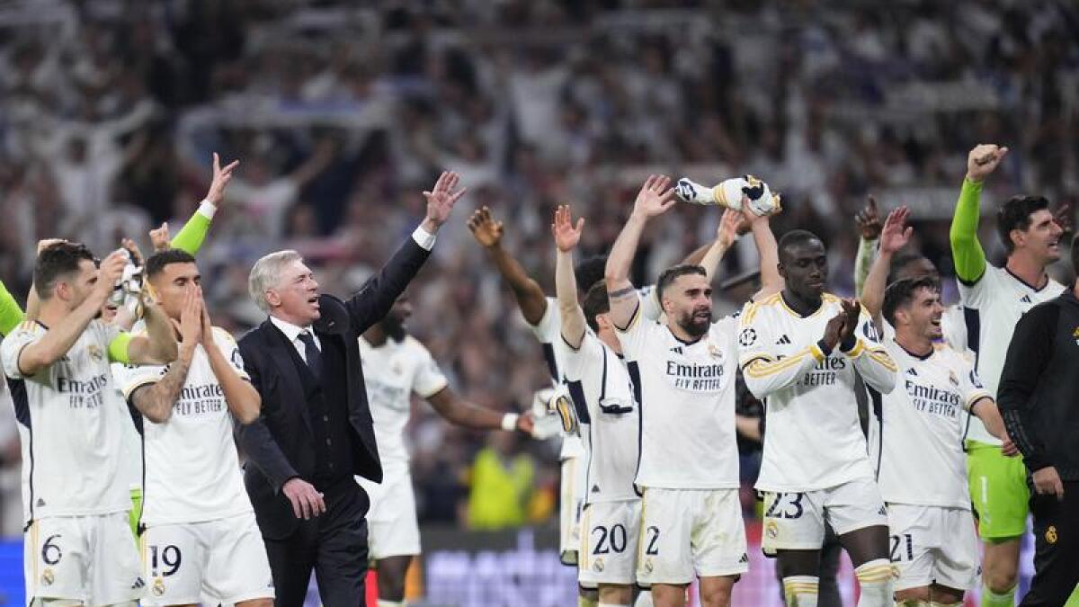 Real Madrid players and coach Carlo Ancelotti.