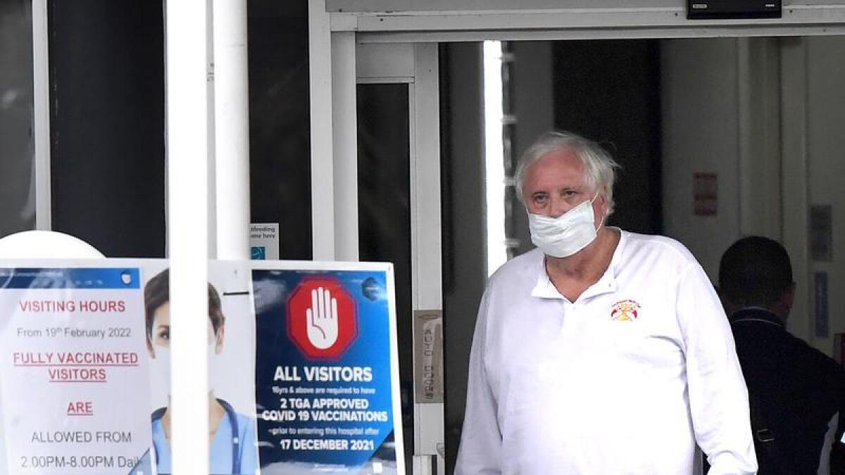 Clive Palmer leaves Gold Coast hospital after COVID test.