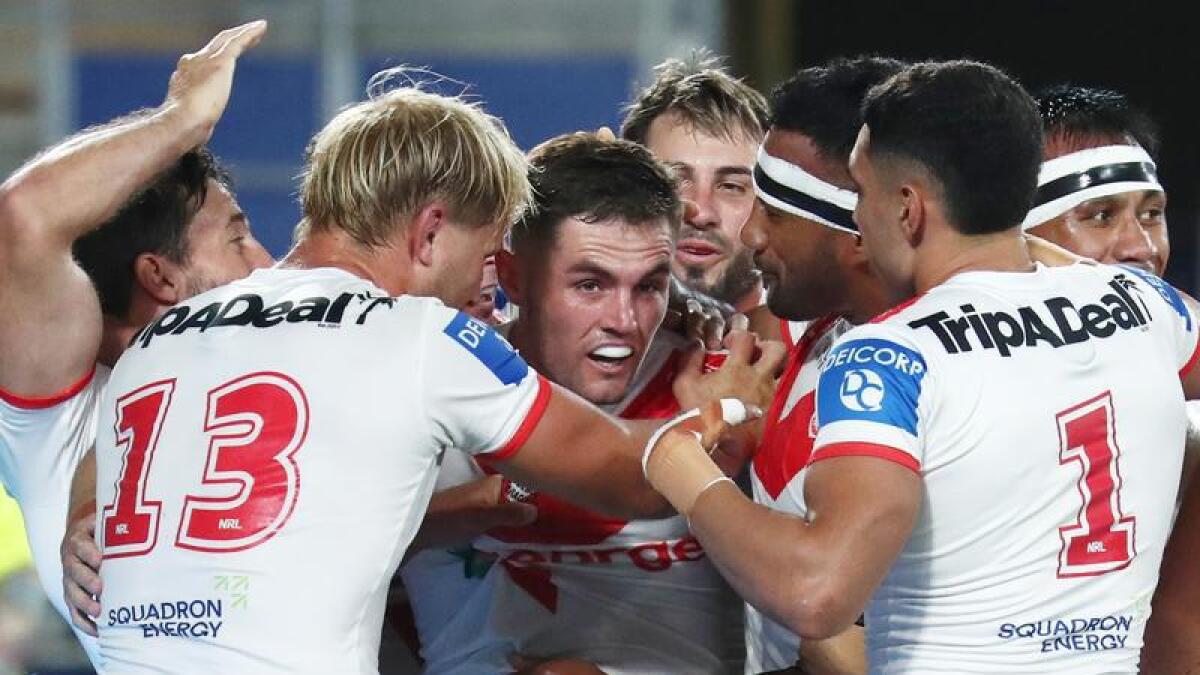 Kyle Flanagan celebrates a try for St George Illawarra.