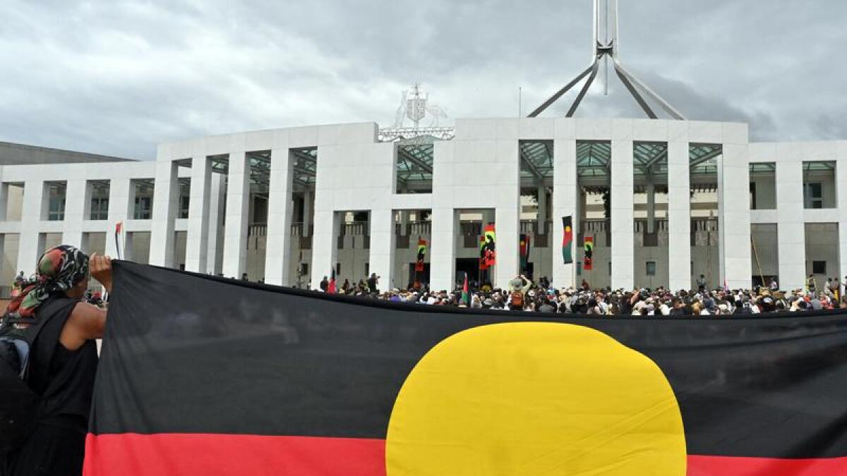 An invasion day rally at Parliament House in Canberra