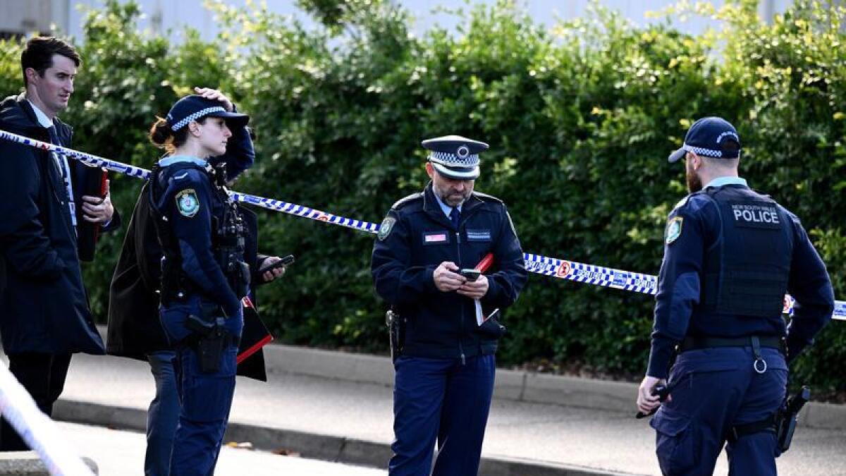 Police at the scene of a stabbing at the University of Sydney.