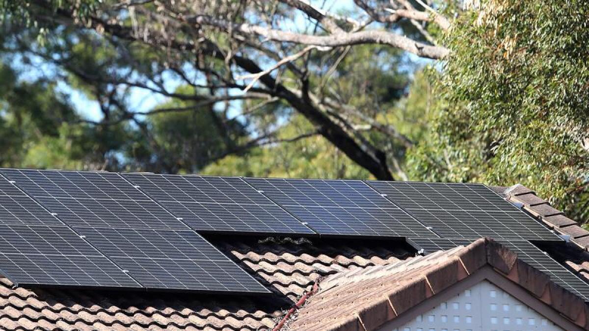 Solar panels are seen on a roof in Brisbane