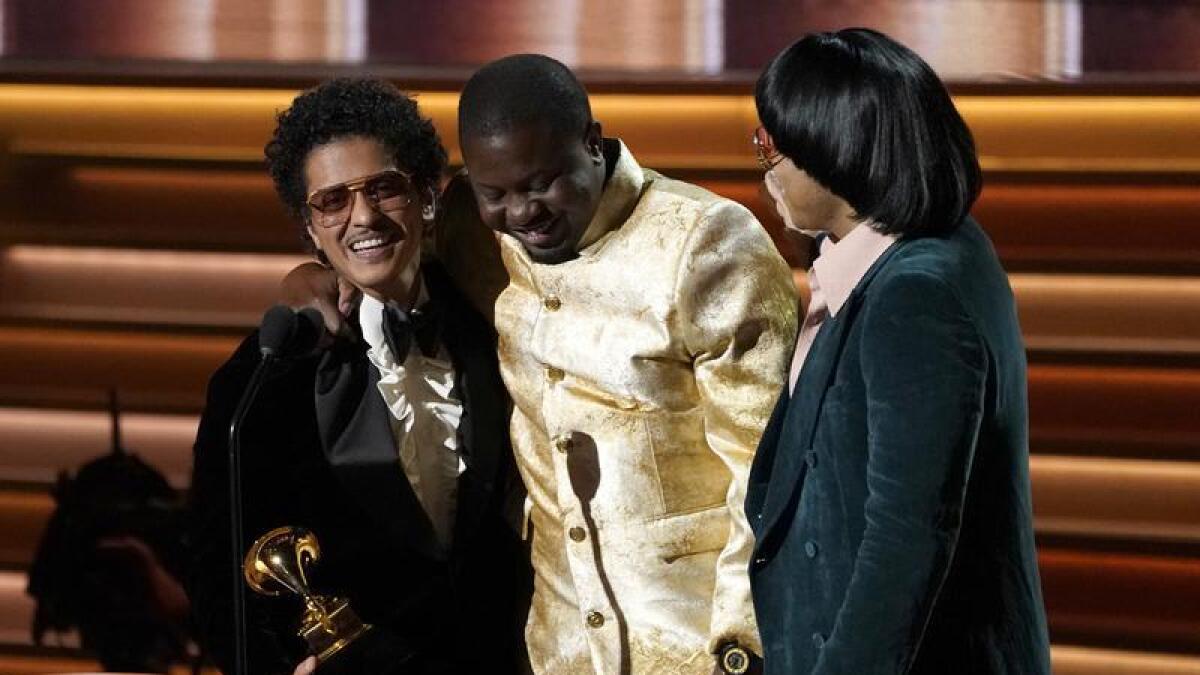 Jon Batiste accepts the Grammy Award for album of the year.