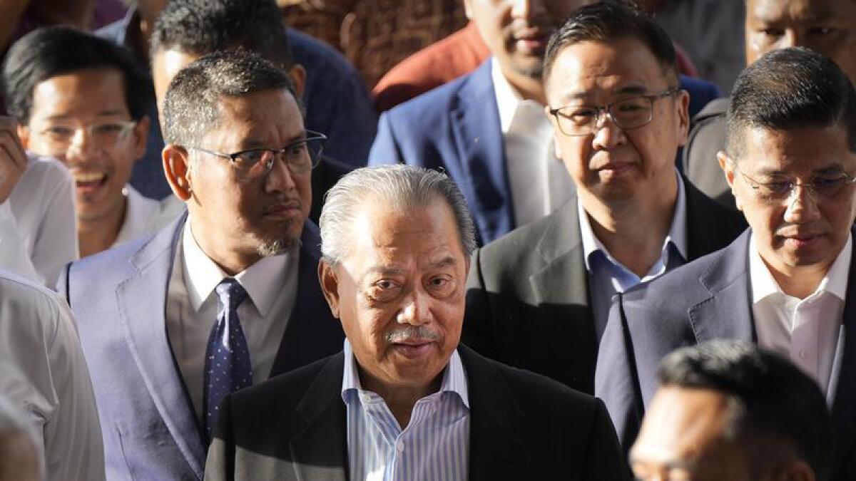 Malaysia's former Prime Minister Muhyiddin Yassin arrives at court