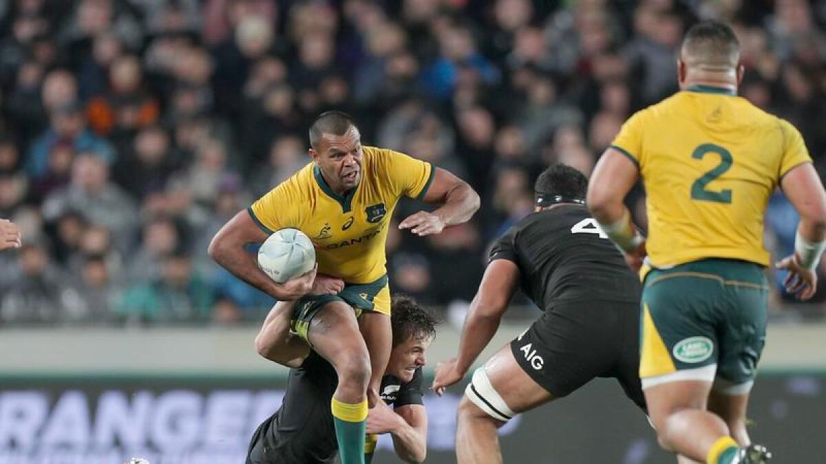 Kurtley Beale (centre) in action for the Wallabies. 