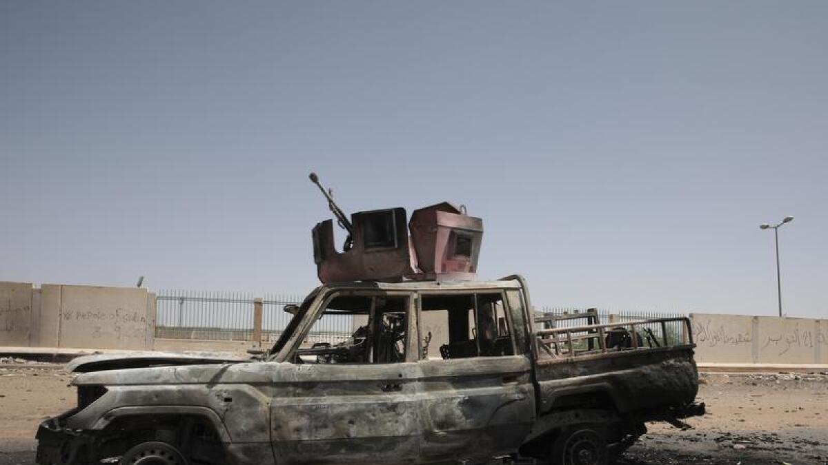 A destroyed military vehicle in Khartoum