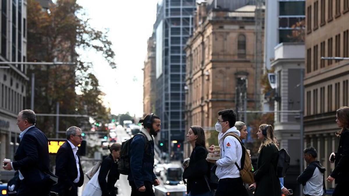 People crossing road in Sydney's CBD