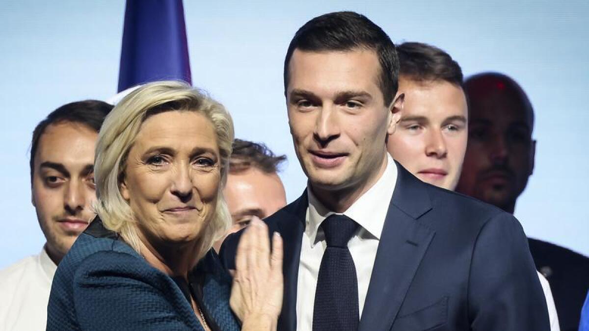 French far-right National Rally's Marine Le Pen and Jordan Bardella