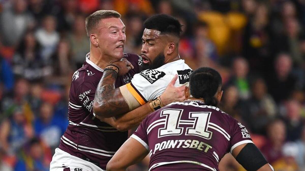 Action from Manly v Broncos in Magic Round 2023. 