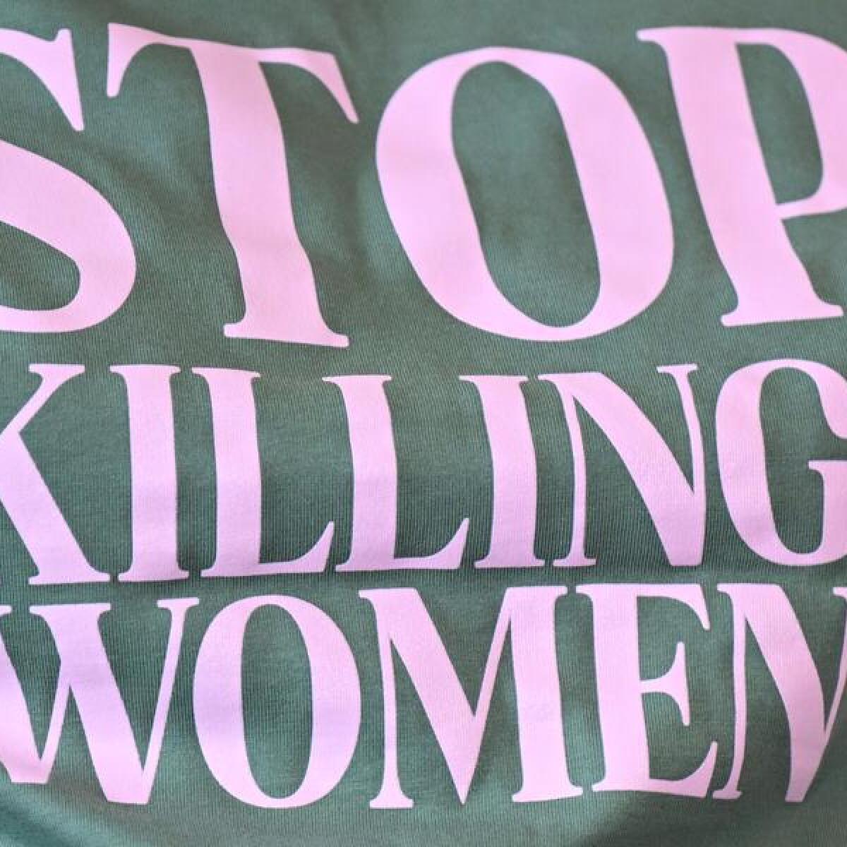 A shirt that says stop killing women.