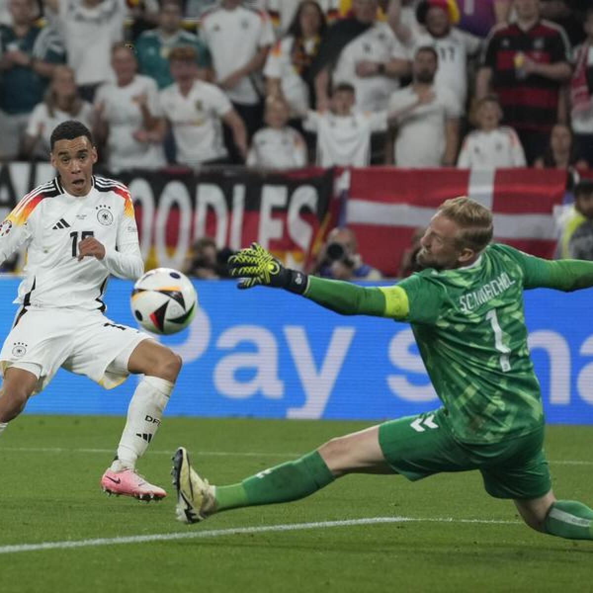 Jamal Musiala scores for Germany against Denmark.